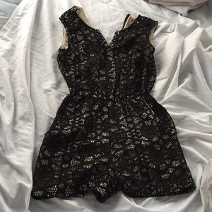 Black lace romper with pockets